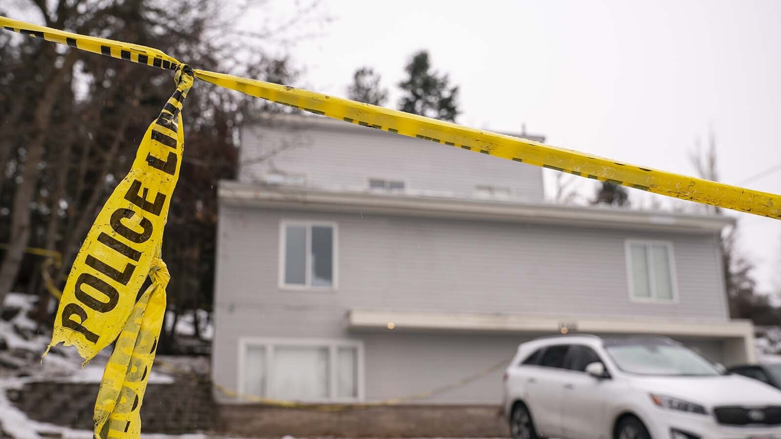 Police tape is seen at a home that is the site of a quadruple murder in Moscow, Idaho.