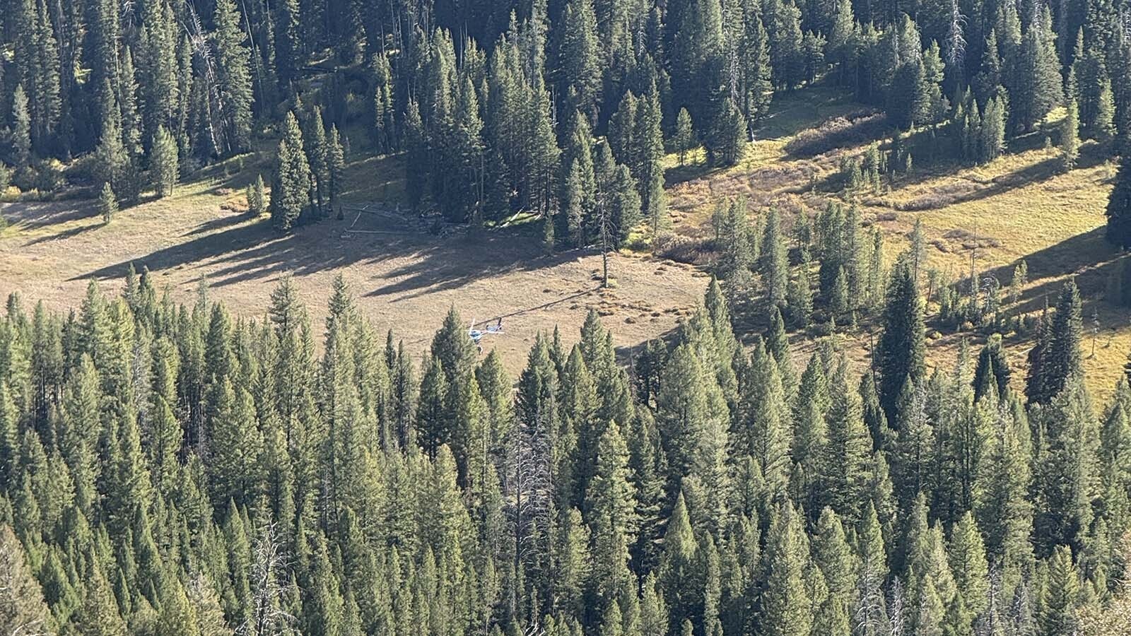 This is Idaho backcountry where lost hiker Heather Wayment was found Sept. 18. In this photo, a search and rescue chopper that transported her can be seen in a meadow far below.