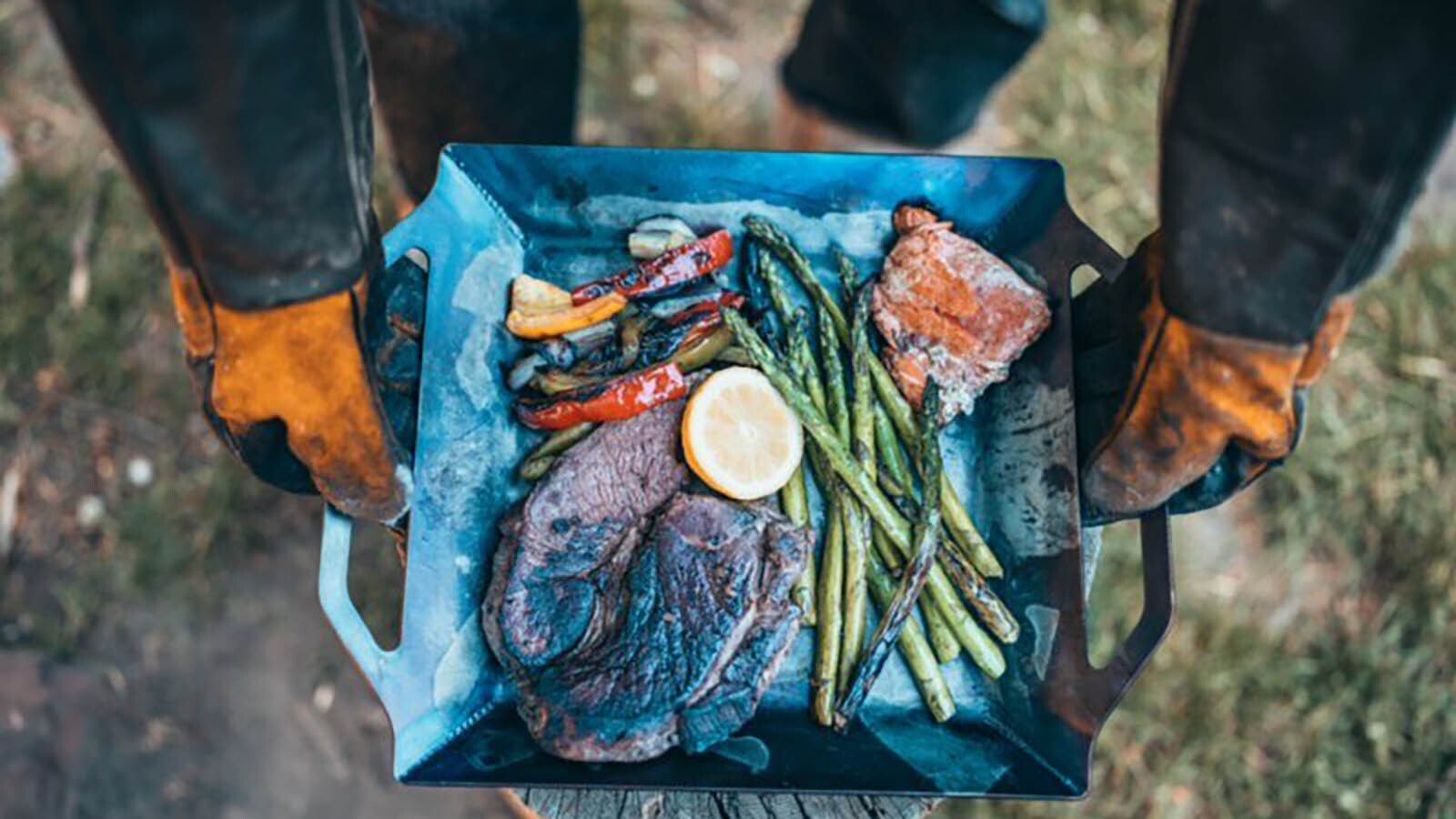 A carbon steel chapa, built for healthy cooking over an open fire.