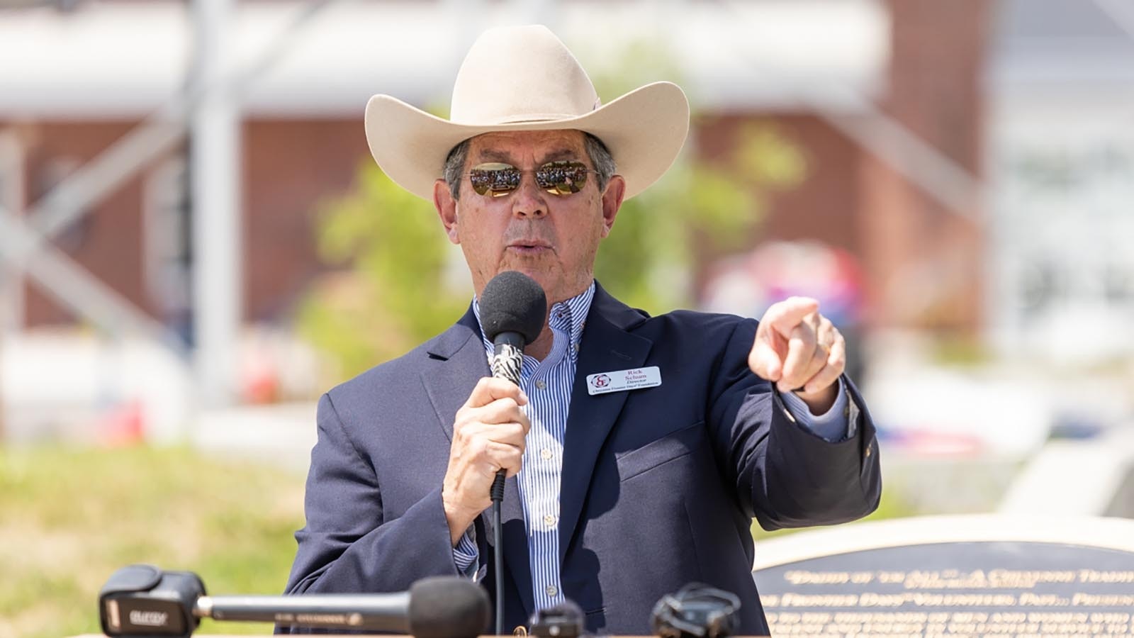 Rick Schum, director for the Cheyenne Frontier Days Foundation, speaks at the Cheyenne Frontier Days American Indian Village Project unveiling ceremony at Frontier Park in Cheyenne on July 19, 2024.