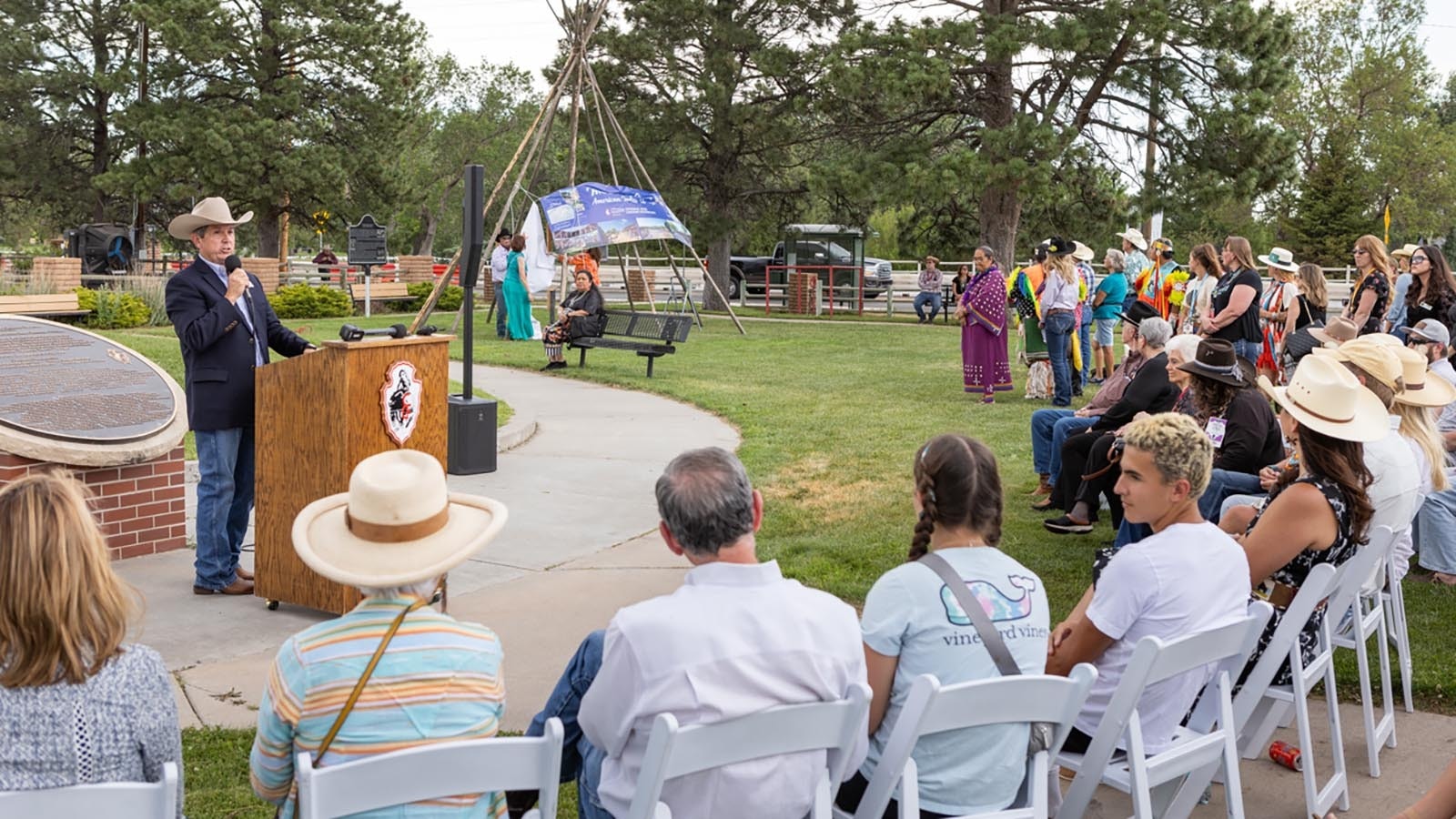 Rick Schum, director for the Cheyenne Frontier Days Foundation, speaks at the Cheyenne Frontier Days American Indian Village Project unveiling ceremony at Frontier Park in Cheyenne on July 19, 2024.