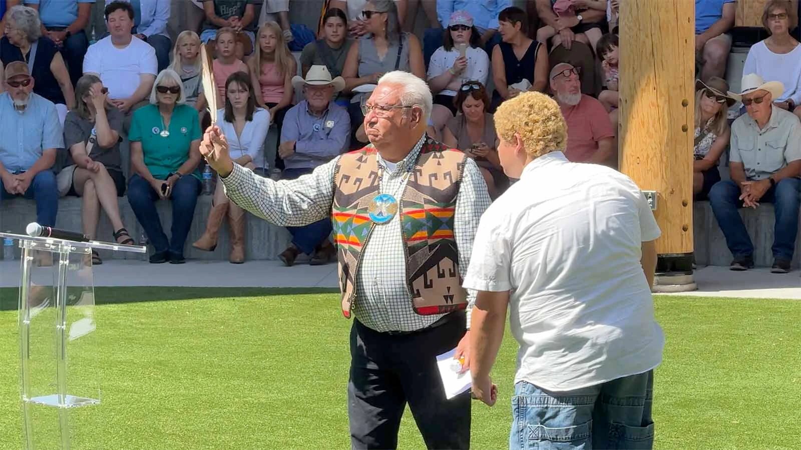 Ivan Posey performs a cedar healing ceremony at the Morning Star American Indian Village grand opening on Friday, July 17, 2926.