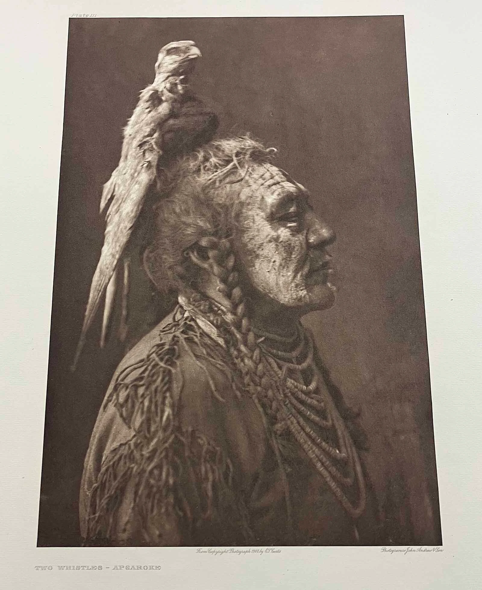 A native’s headgear was part of his profile shot.