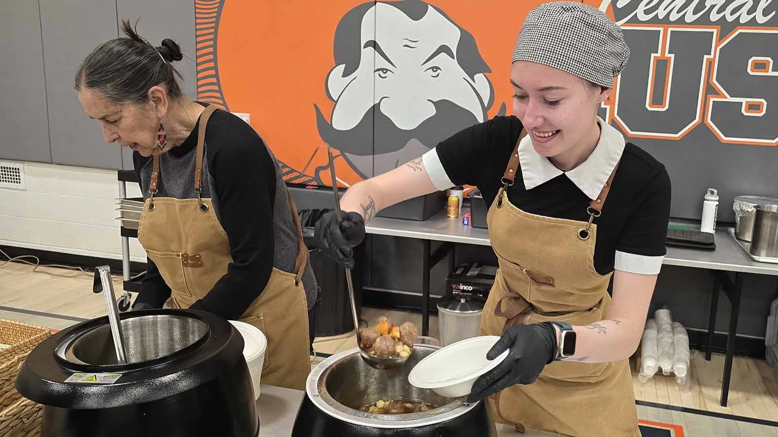 A Central Wyoming College culinary student serves up a bowl of posole for an all-Indigenous lunch during the 2026 Innovation & Entrepreneurship Conference in Riverton.