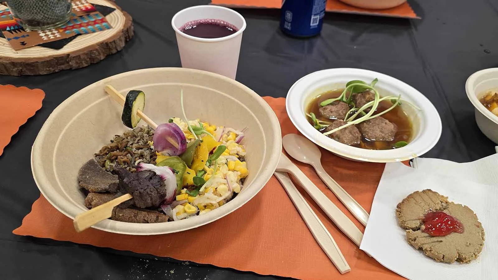 The all-Indigenous lunch plate included huckleberry-braised bison skewers with a wild rice and juniper pilaf, as well as bison meatball posole, roasted mushroom and bean medley, corn-wild rice cake, and jicama sweetcorn slaw.
