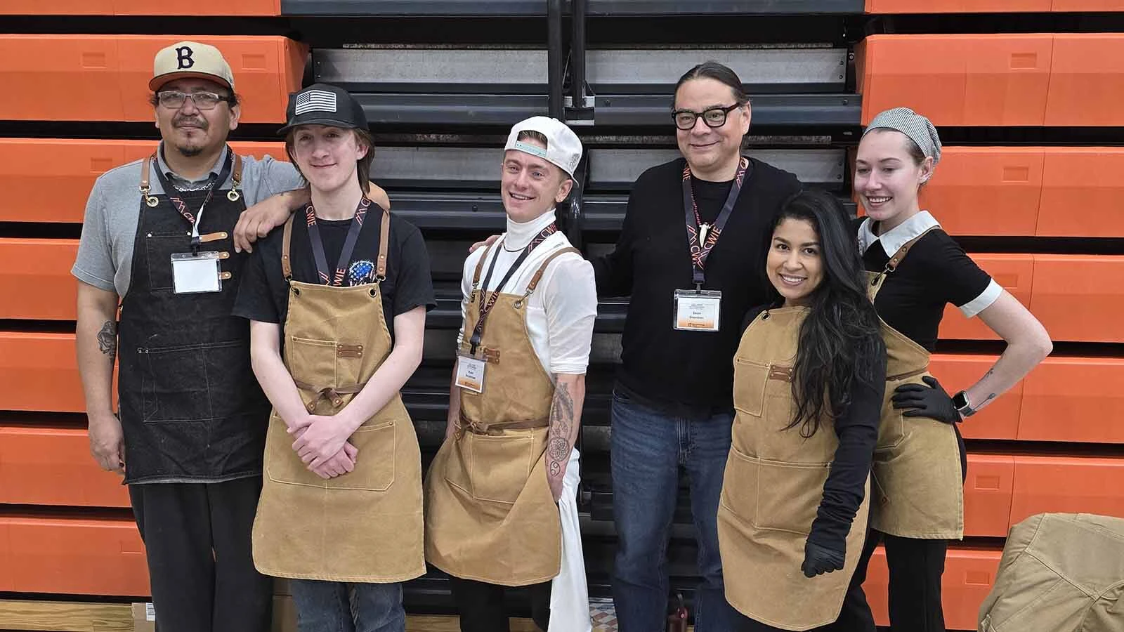 Chef Sean Sherman poses with Central Wyoming College culinary students after they finishes serving an Indigenous lunch menu during CWC's 2026 Innovation & Entrepreneurship Conference in Riverton.
