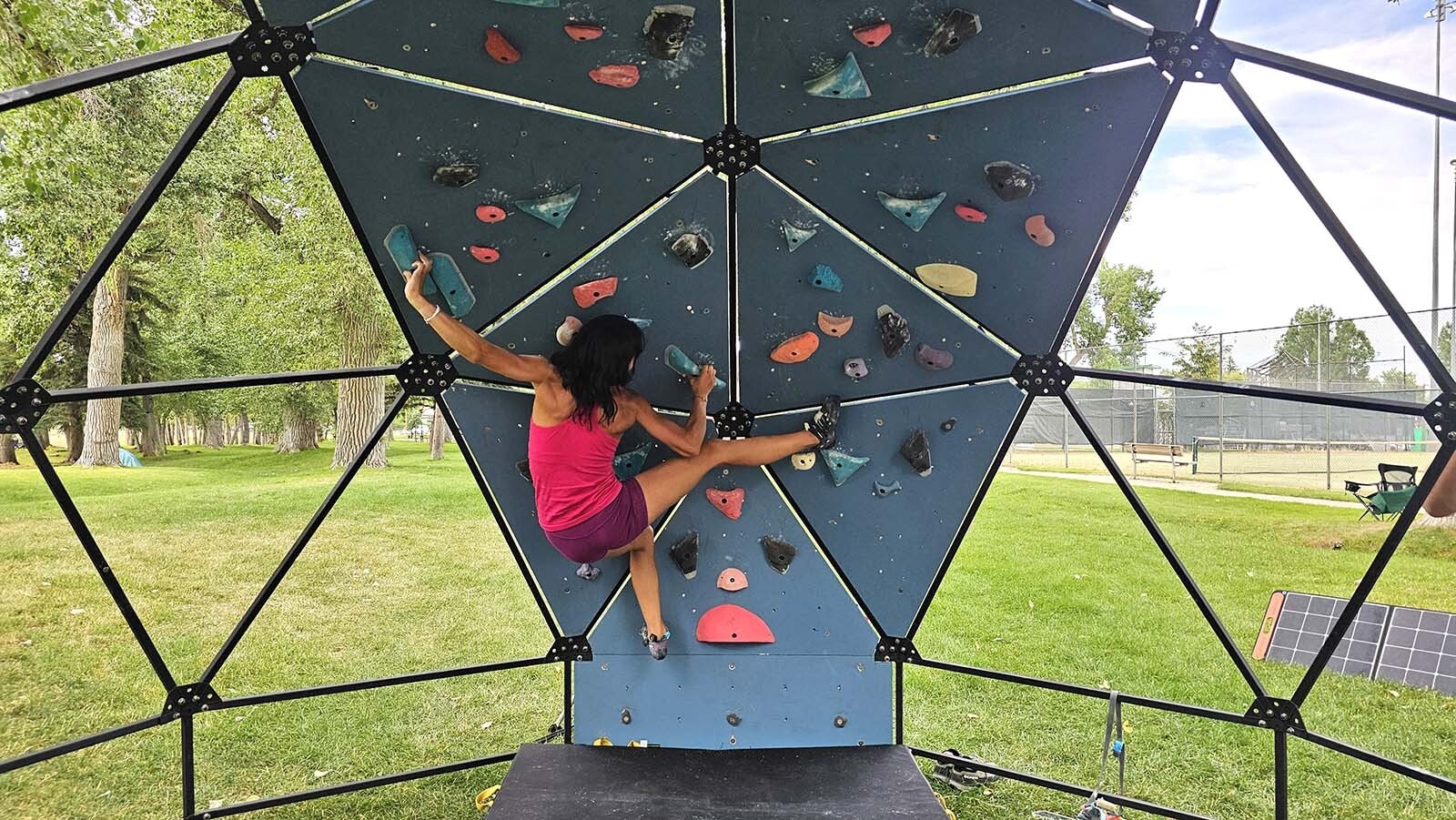 Avianna Frady demonstrates how the Domeco can be used to train for rock climbing during the International Climbers' Festival in Lander.