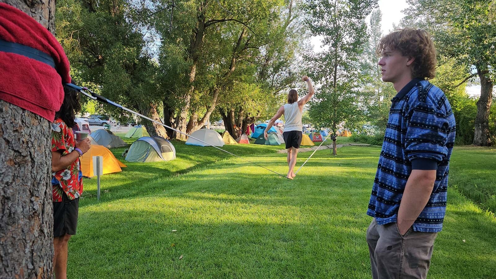 Vijay Krishnan tries out tightrope walking during the International Climbers' Festival in Lander. It was his first time at the festival, but he had a great time and said he's likely to return from now on.