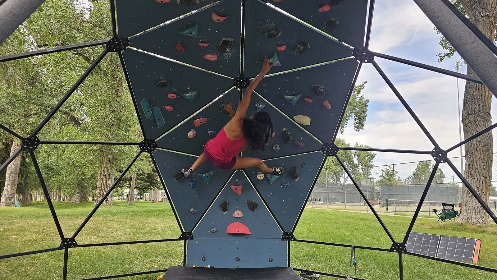Avianna Frady demonstrates how the Domeco can be used to train for rock climbing during the International Climbers' Festival in Lander.