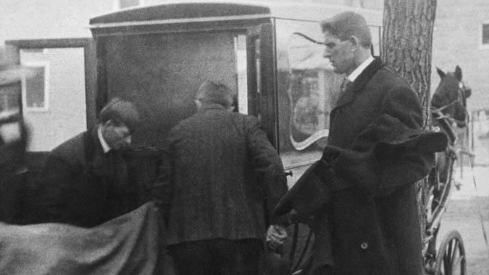 The body of Tom Horn is placed in a hearse following his hanging using the hydraulic gallows.