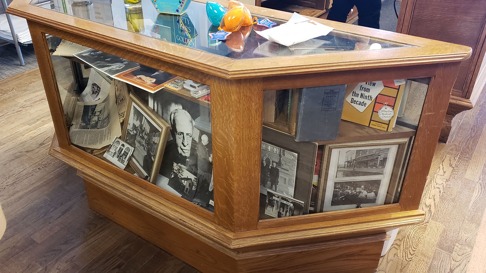 Some photos and memorabilia are displayed in the store.