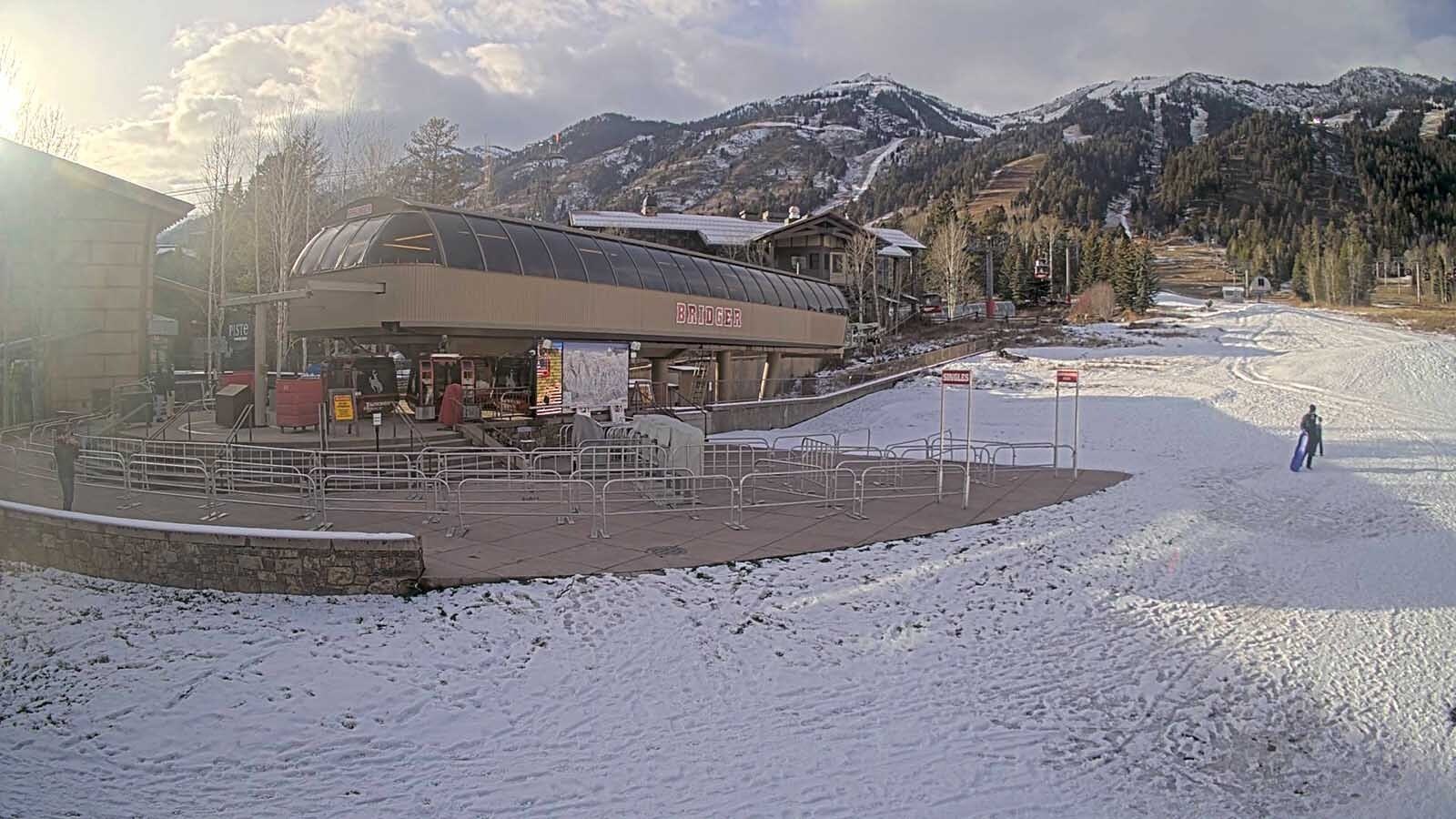 Northwest Wyoming ski resorts have had to postpone their scheduled openings because of a lack of snow. Above is a Wednesday webcam view of the gondola base at Jackson Hole Mountain Resort.