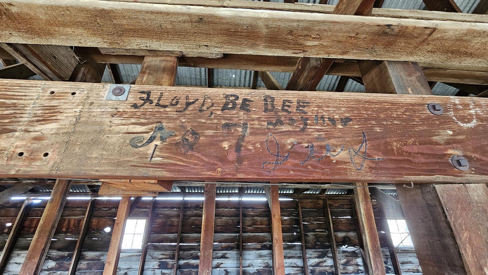 A sheep shearer name carved into the wood at the JO Ranch in Carbon County.