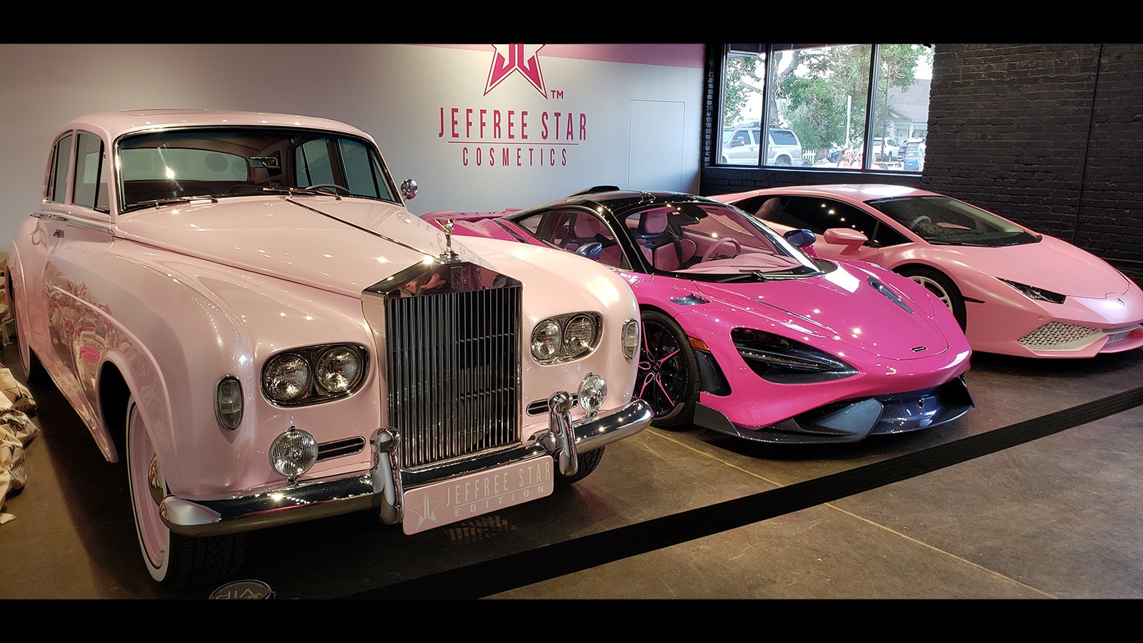 A few of Jeffree Star's pink vehicles on display.