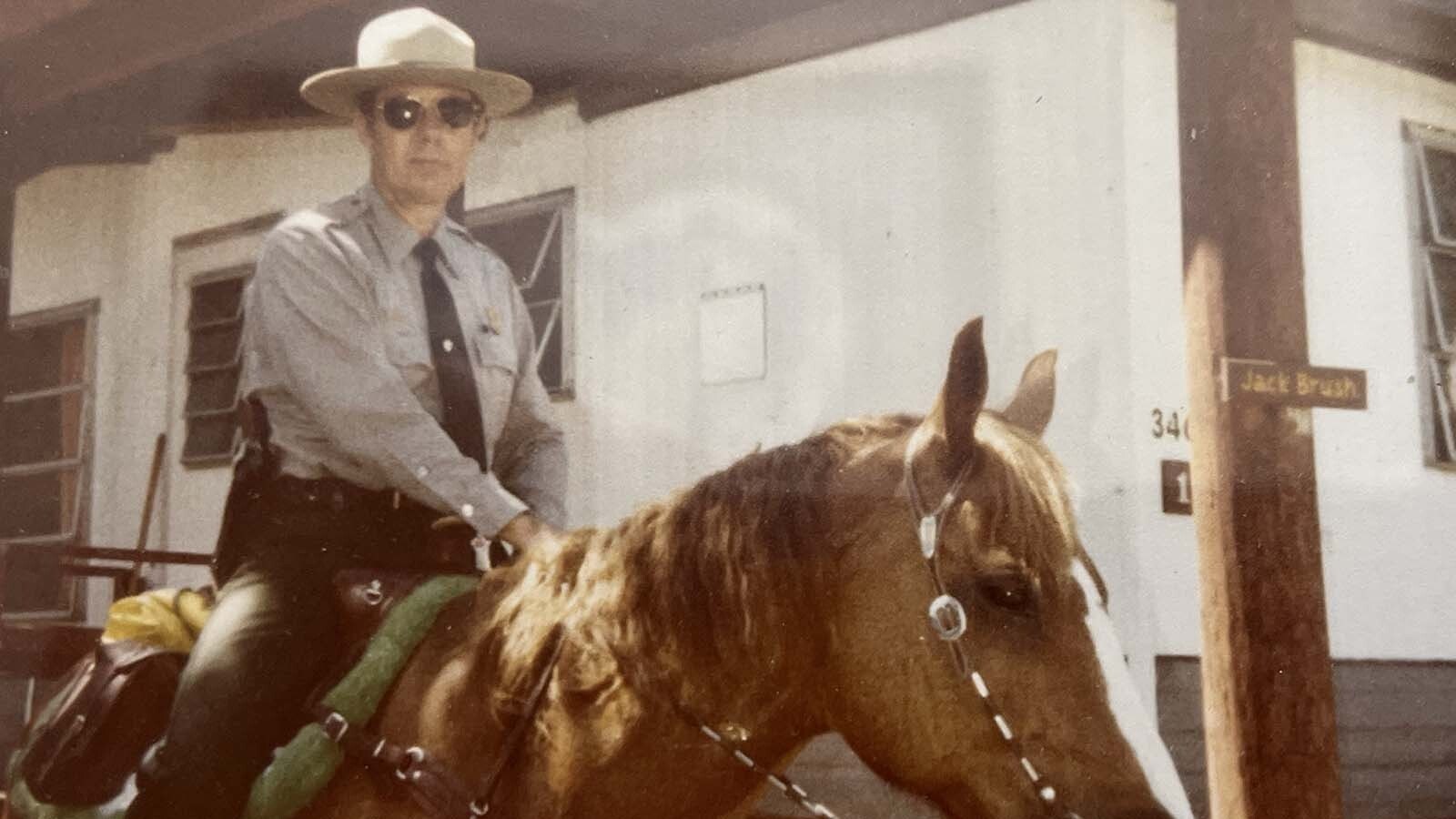 LAPD Policeman Jack Brush would take his vacations in Yellowstone National Park every year and eventually signed up as a law enforcement ranger where his favorite assignment was riding his horse, Ace, on patrol around Old Faithful.