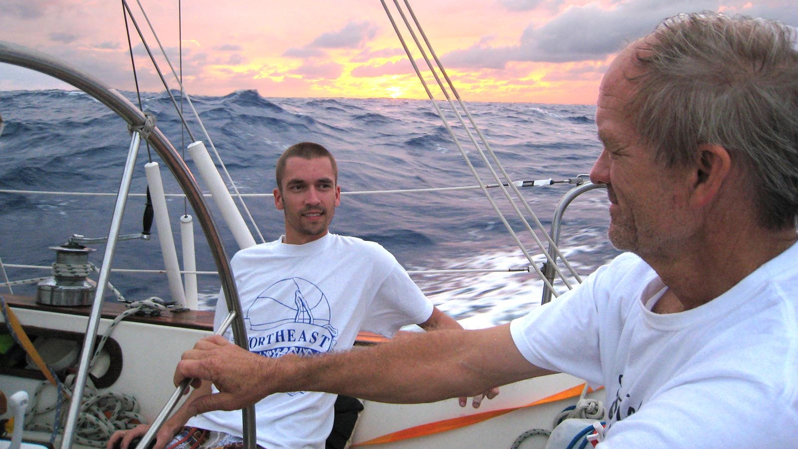 Jack O'Rourke and Michael, his youngest son, several hundred miles off the coast of North Carolina as the sun goes down on a 1,200-mile sail south to the Virgin Islands.