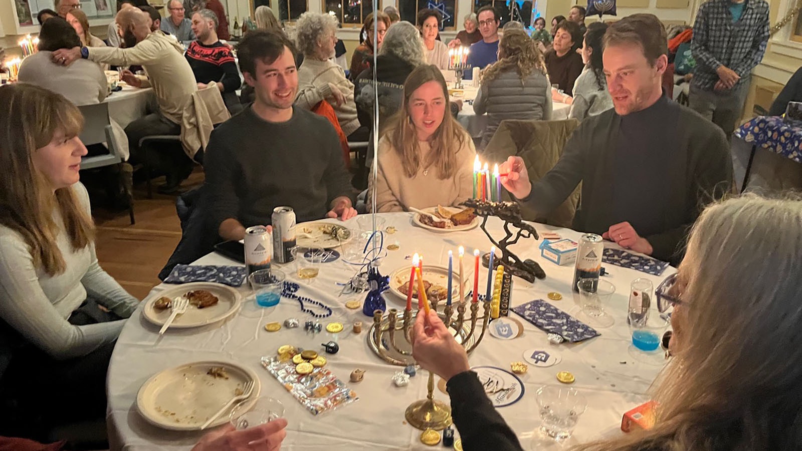 Members of the Jackson Jewish community celebrate lighting their menorahs in 2022.