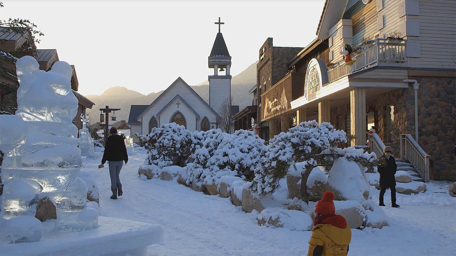 A scene from "Americanville," a documentary on Jackson Hole, China. A Christian church at the end of this street that looks every bit as if it could be in Jackson, Wyoming.