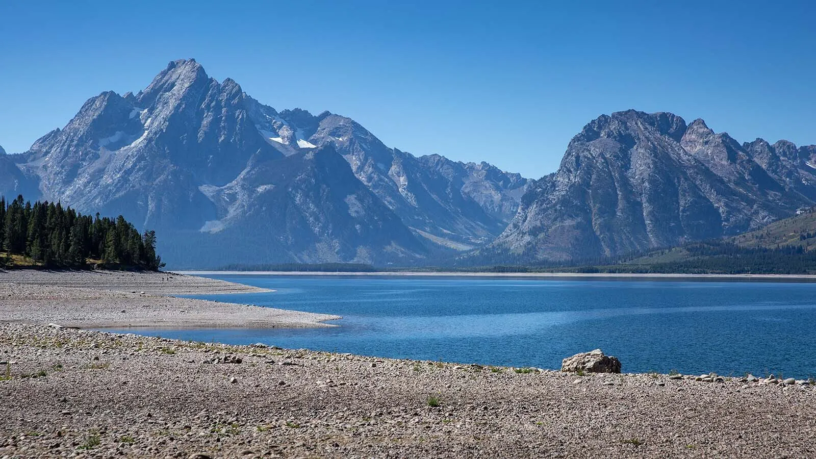 Scenic boat tours on Jackson Lake in Grand Teton National Park have shut down two months early due to low water levels as southern Idaho agricultural users draw from the lake. Large boats are unable to get out of Colter Bay Marina onto the main lake.