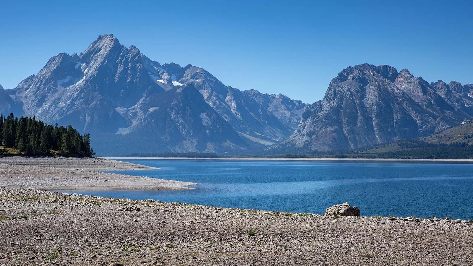 Scenic boat tours on Jackson Lake in Grand Teton National Park have shut down two months early due to low water levels as southern Idaho agricultural users draw from the lake. Large boats are unable to get out of Colter Bay Marina onto the main lake.