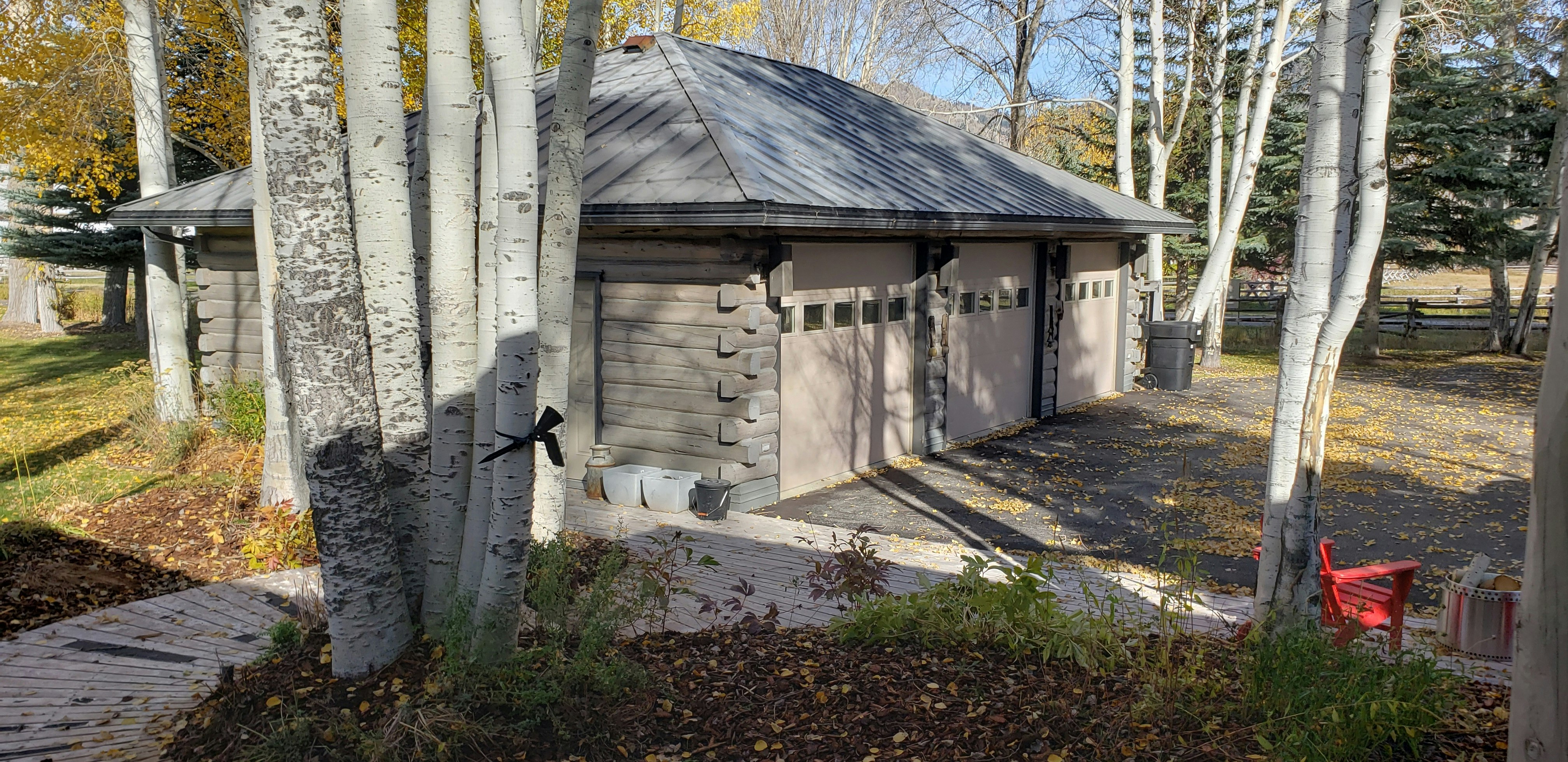 The three-car heated garage is a short walk from the Western Star Ranch's cabin.