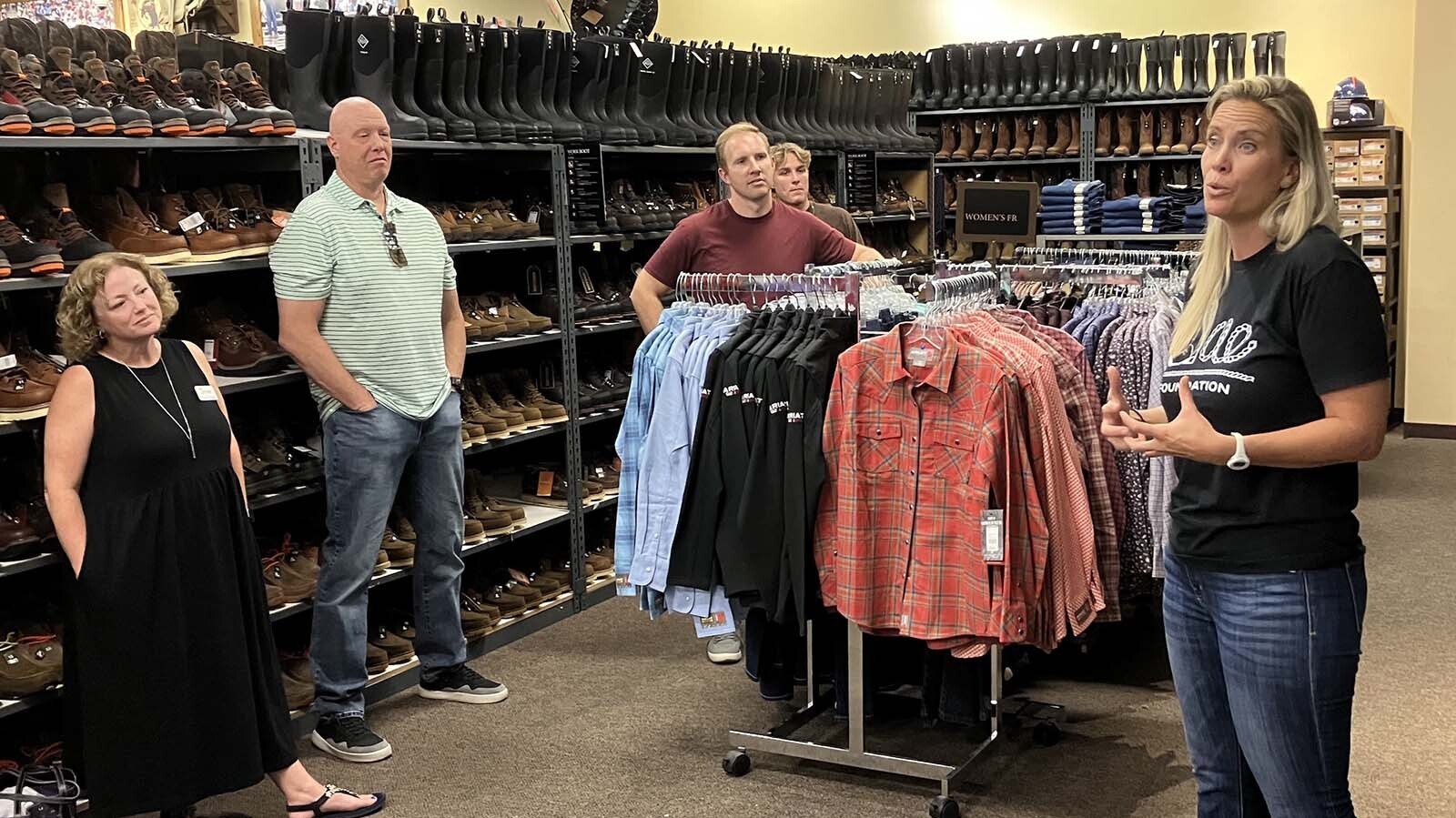 Jae Foundation Wyoming Coordinator Julie Mackey, right, shares the story about Jae Bing and how the Jae Foundation started at the Boot Barn in Casper.