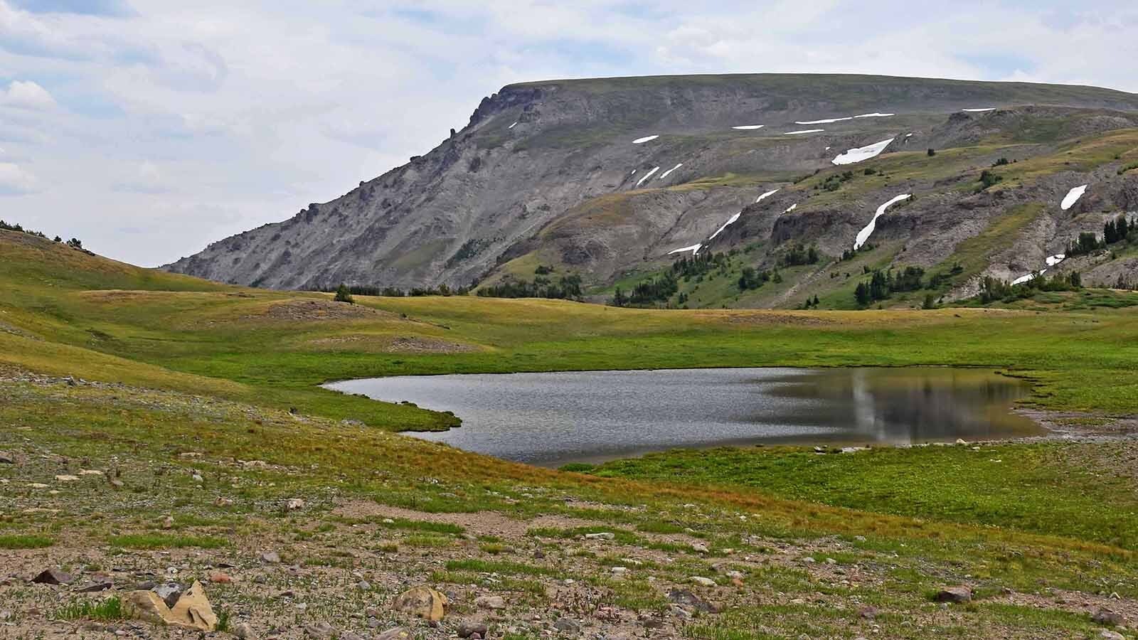 Brian Beauvais' photo taken in August 2024 of the drainage and lake features slightly less snow.