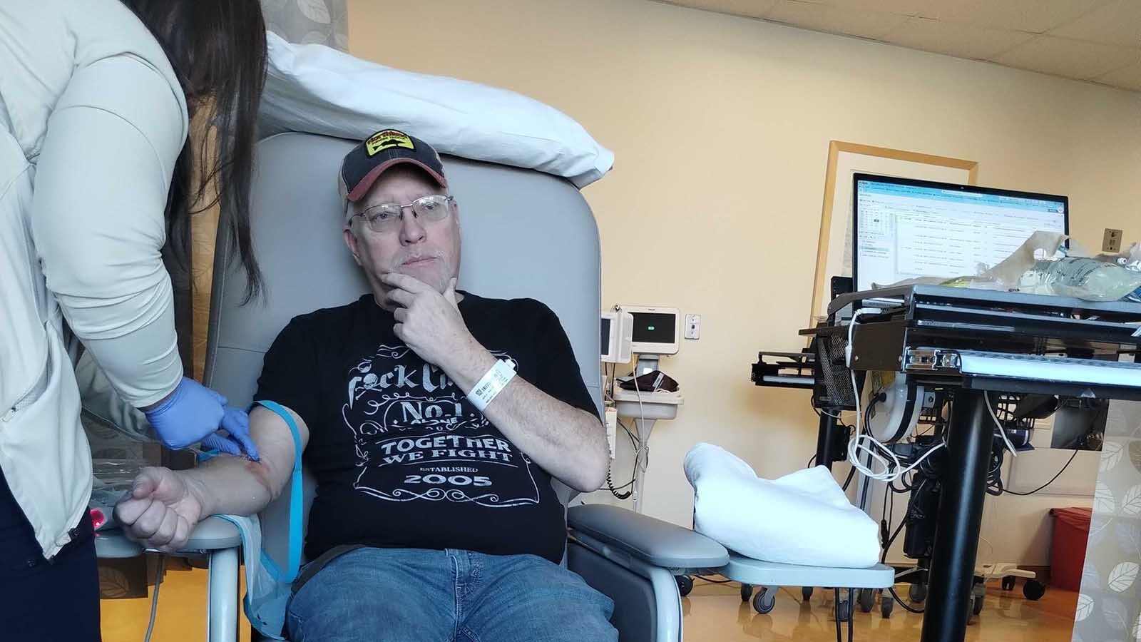 James Harris gets ready for chemotherapy during his long fight with kidney cancer.