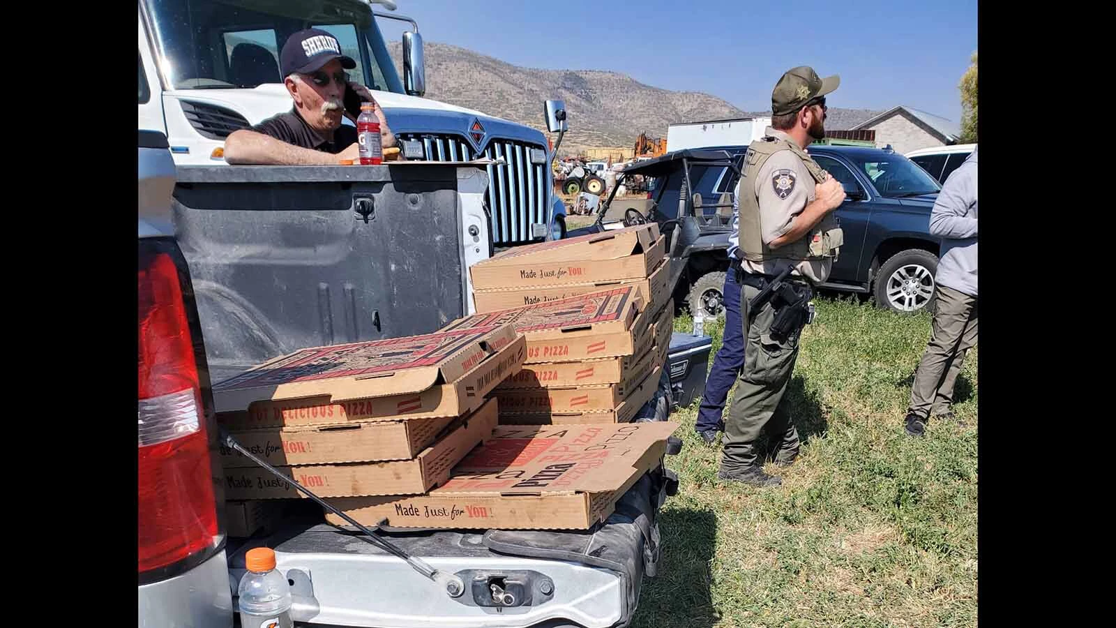 Stacks of pizza feed deputies, SWAT officers and other law enforcement personnel during a lengthy fugitive operation in rural Utah. 