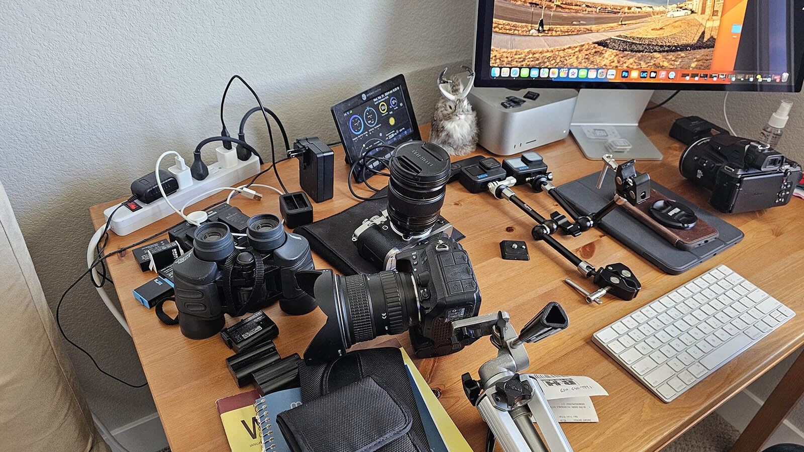 The gear Jan Curtis uses to capture his stunning images of celestial events; a tripod, a few GoPros and some inexpensive digital cameras, plus a little meteorological knowhow.