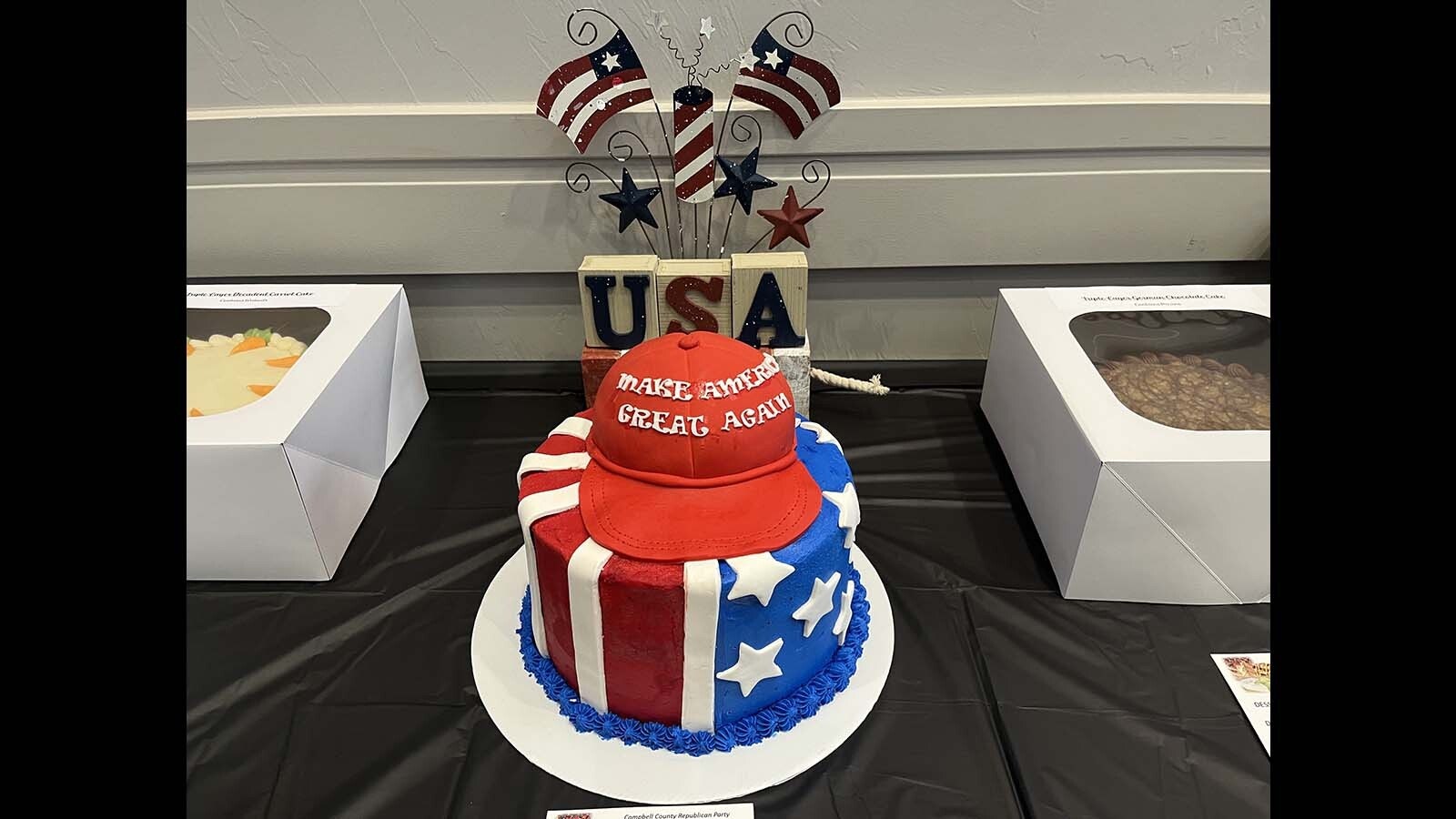 A colorful MAGA cake before it brought $290 at an auction Saturday.