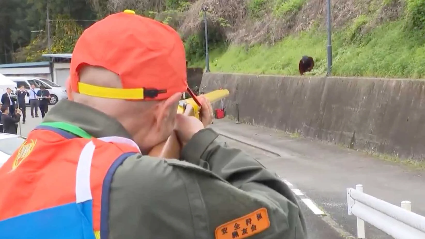In Japan, civilians are being trained to respond to a growing number of bear attacks by shooting darts at a man in a bear suit.
