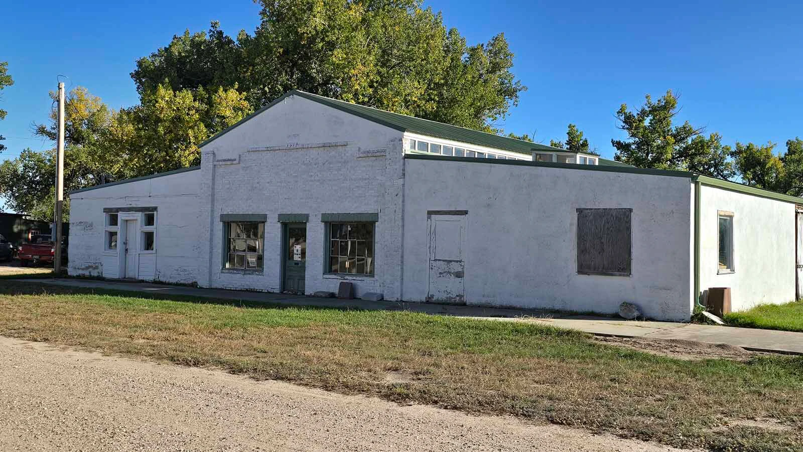The Jay Em stonecutting garage still has large rock taken from Rawhide Buttes for cutting. Family members say that some of the stones cut here were sent to the Capitol for fireplace mantels. They are still there.