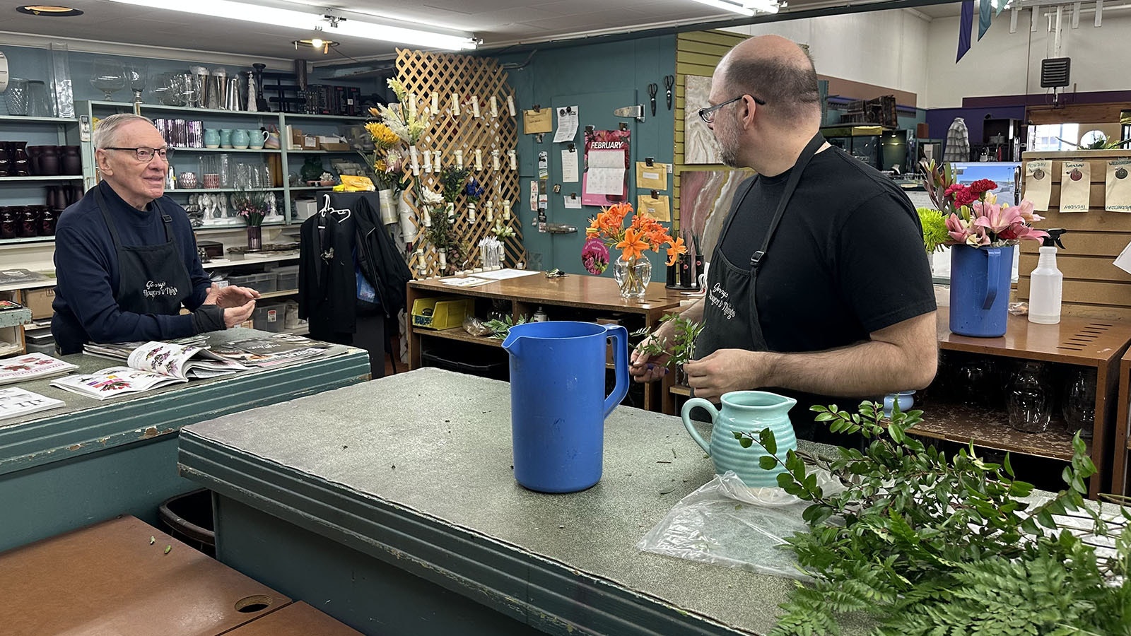 Jerry Kintzler and his assistant, David Black, discuss flower arrangements and future plans for the store, Jerry’s Flowers and Things, in downtown Riverton, Wyoming. Kintzler has been selling flowers and unique gifts for 50 years in his childhood town.