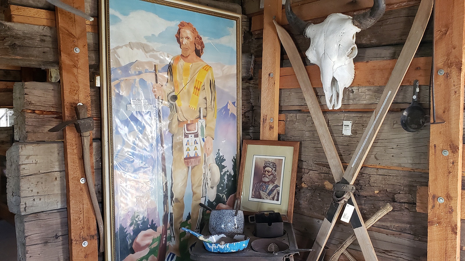 Some of the portraits of Jim Baker are displayed inside the cabin fortress the mountain man built in Savery.