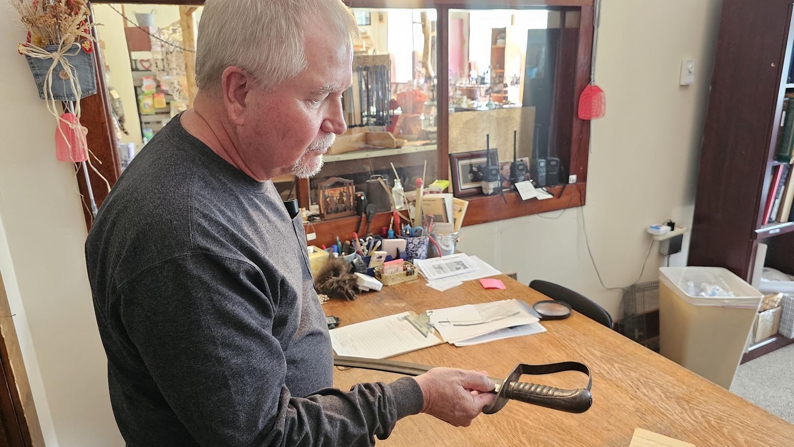 William Stocks talks about the marks imprinted on an 1821 sword that once belonged to Jim Baker. Stocks' family were given the sword by Baker, after convalescing in Stocks great-grandmother Tennie C. Boyd's boarding house in Dixon in 1891.