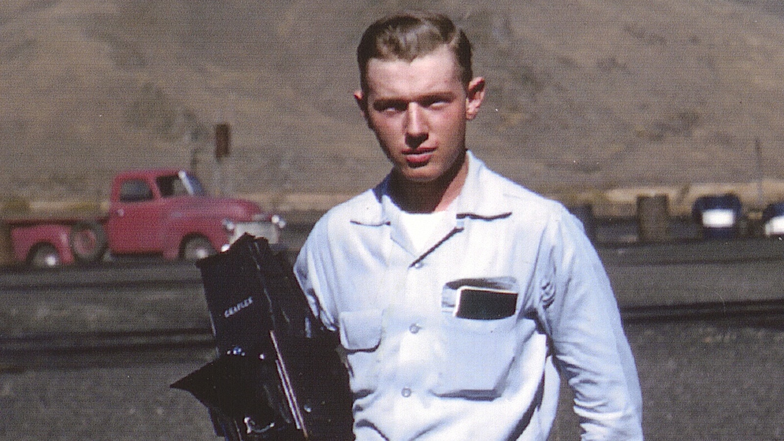 Jim Ehernberger with his Graflex camera out taking photos on the tracks in 1955.