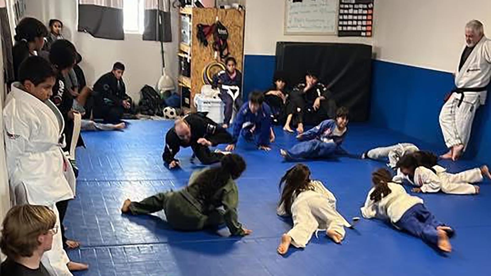 Members of the team provide instruction.