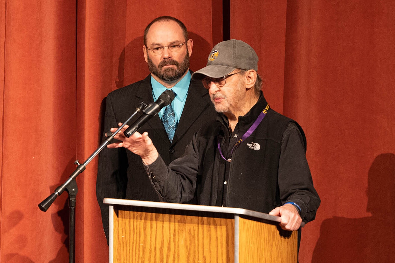 Joe Arnold, the longtime custodian for the Hot Springs School District 1 administration building, was surprised by an assembly in his honor Wednesday. He's pictured here with Superintendent Dustin Hunt, behind.