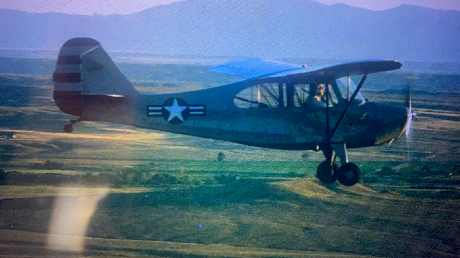 Joe Kenney flying his 1946 Aeronica Champ. Part of his community service was to be on the Lander Airport Board for two decades.