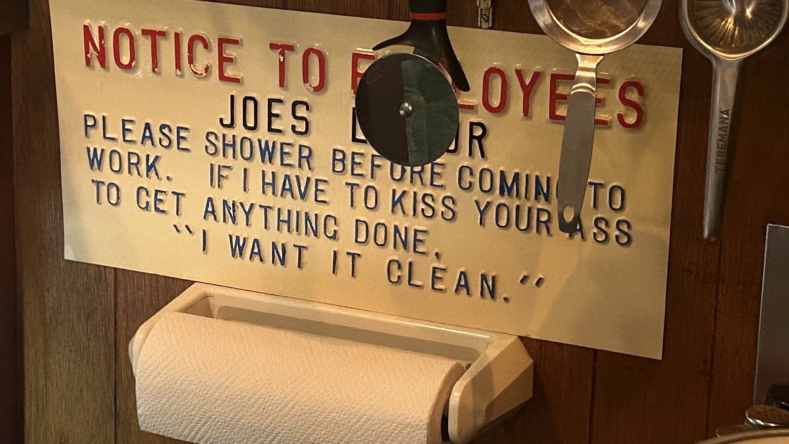 A notice to employees mounted behind the bar at Joes Liquor and Bar in Rock Springs.