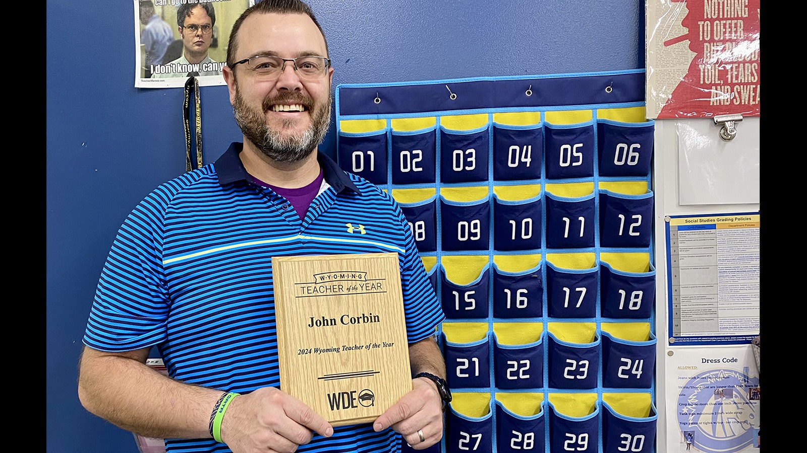 Cody High School teacher John Corbin is the Wyoming Teacher of the Year for 2024. He is pictured by his numbered cellphone caddy, one of the many creative ways he engages students.