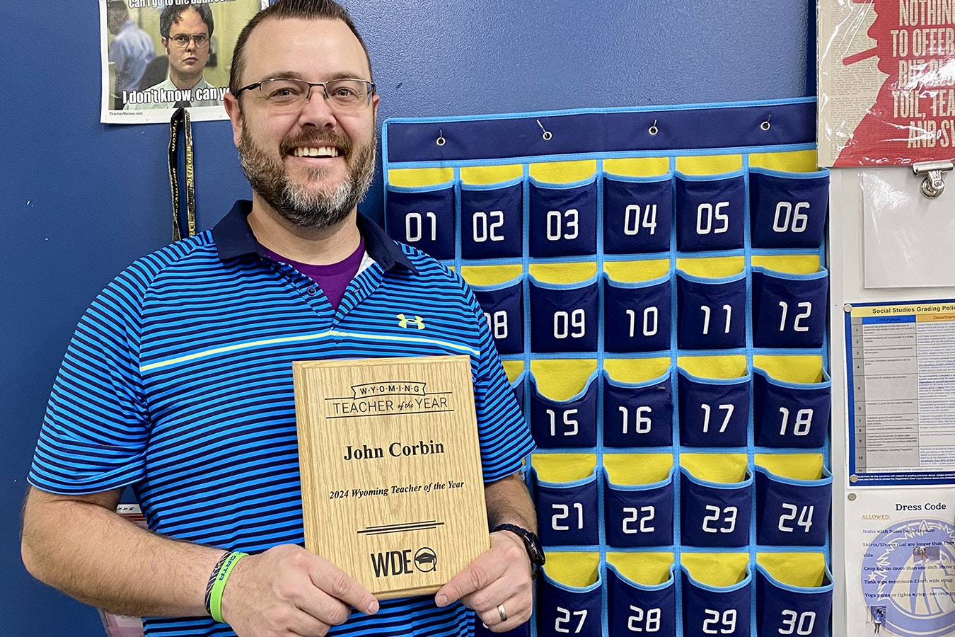 Cody High School teacher John Corbin is the Wyoming Teacher of the Year for 2024. He is pictured by his numbered cellphone caddy, one of the many creative ways he engages students.