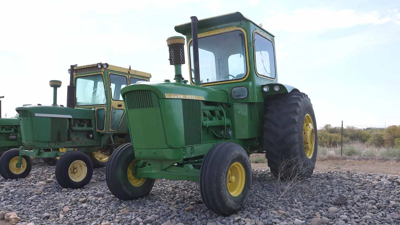 John Deere tractors with cabs that part of Smet’s collection.