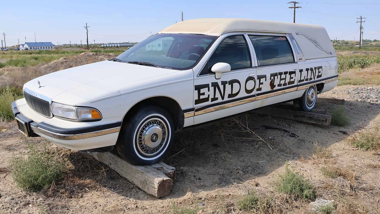A hearse that Pete Smet purchased from a local funeral home marks the end of the row of tractors.
