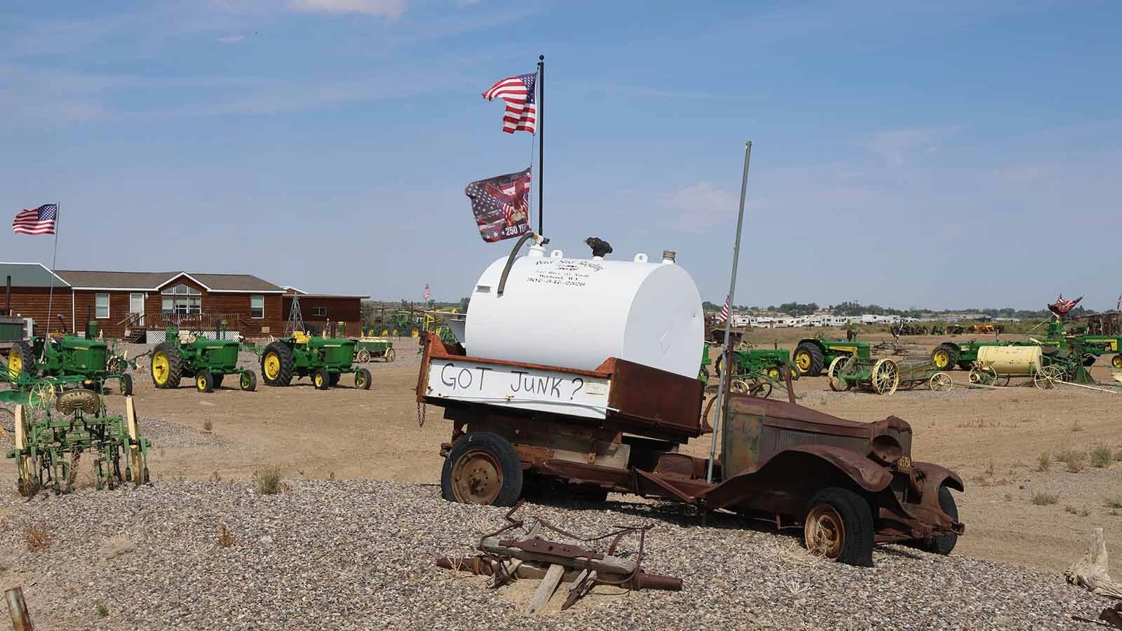 Pete Smet advertises his business with an old truck and tank north of Worland.