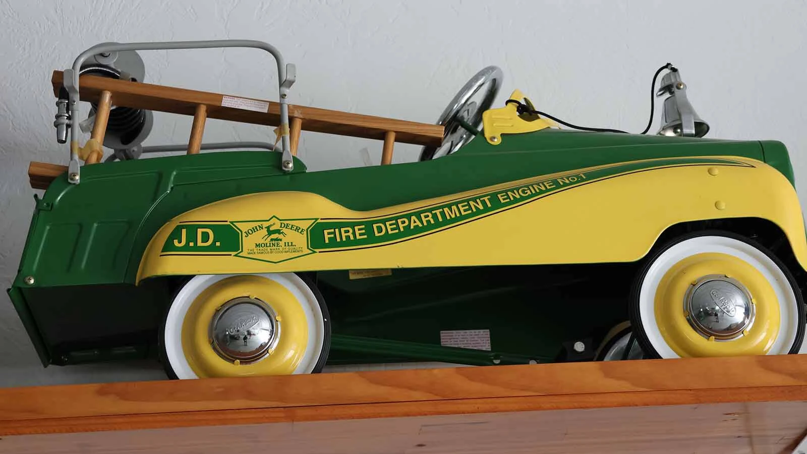 Pete Smet has dozens of toy tractors and vehicles displayed on walls and cases in various buildings. 