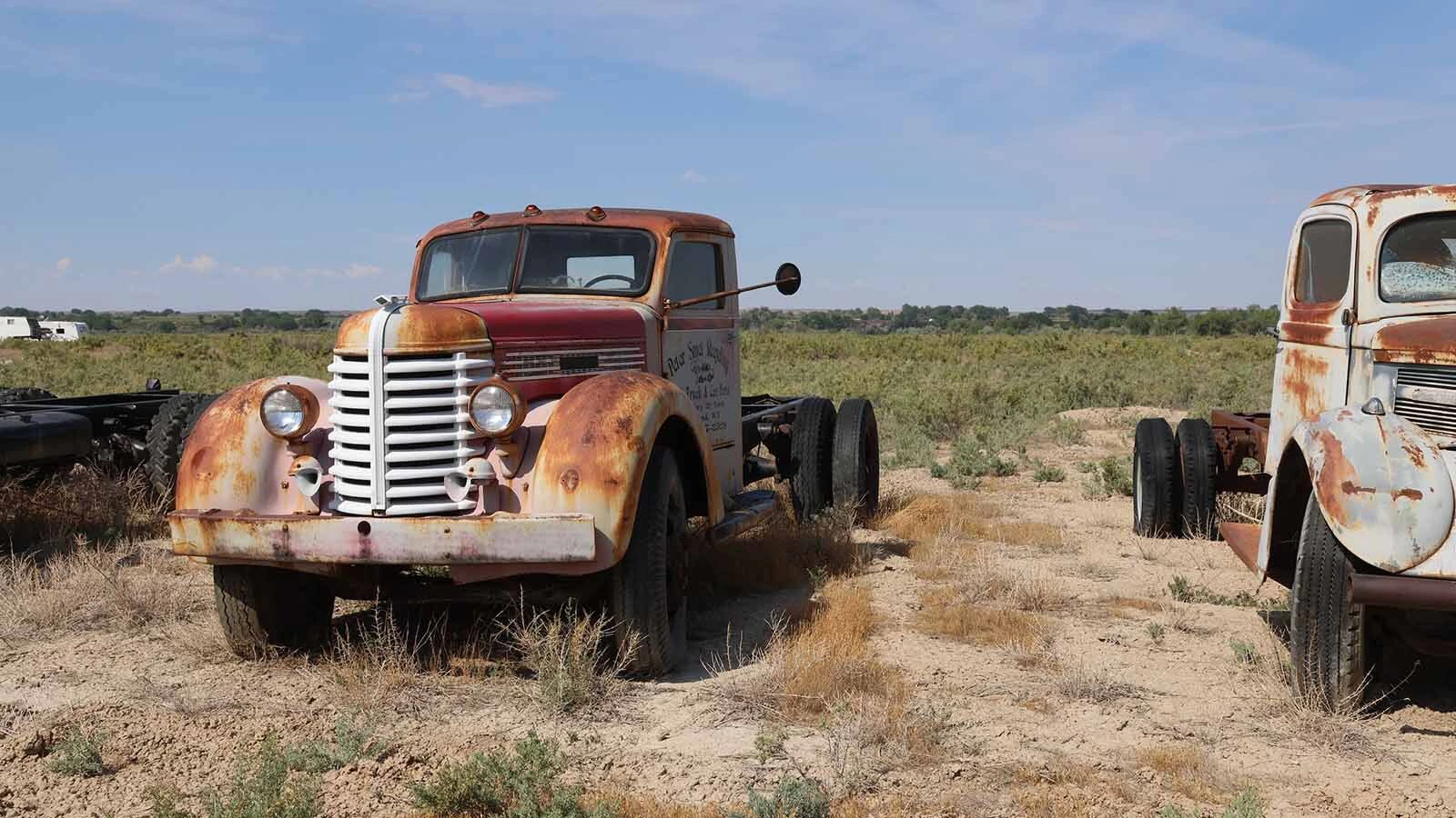 An old truck that still carries a sign for the recycling business. 