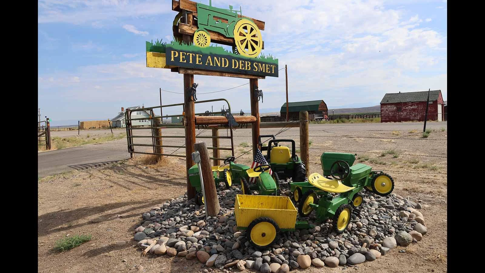 A woman donated two pedal tractors for Pete Smet to put out by his road sign outside his house. He already was displaying two from his own collection. 
