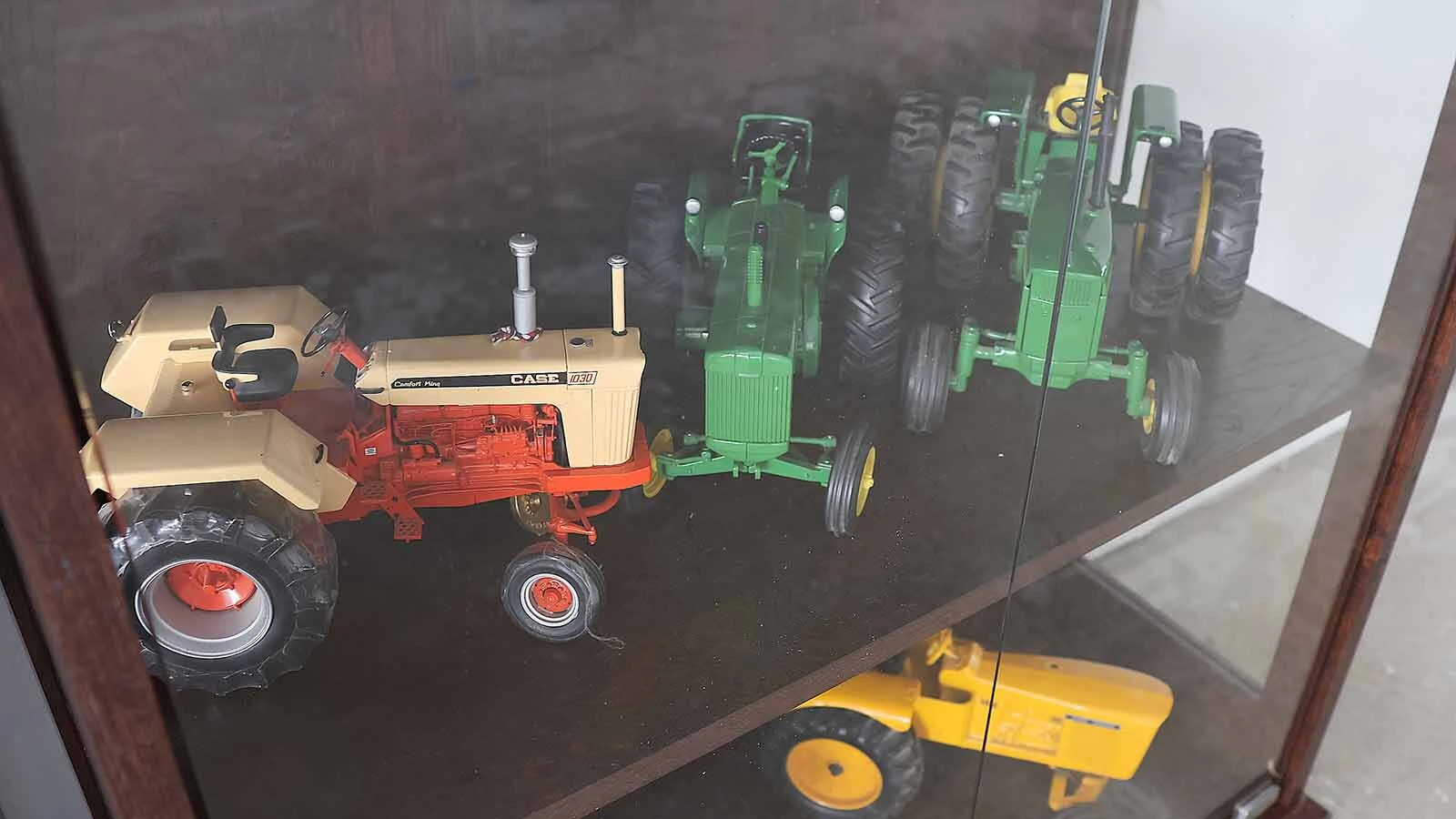 In addition to his John Deere toy tractor collection, Pete Smet has a few other brands of tractors. 